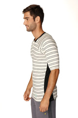 A man wearing a 4-rth mens vintage-stripe henley tee in french terry loop dark grey with horizontal stripes and black panels