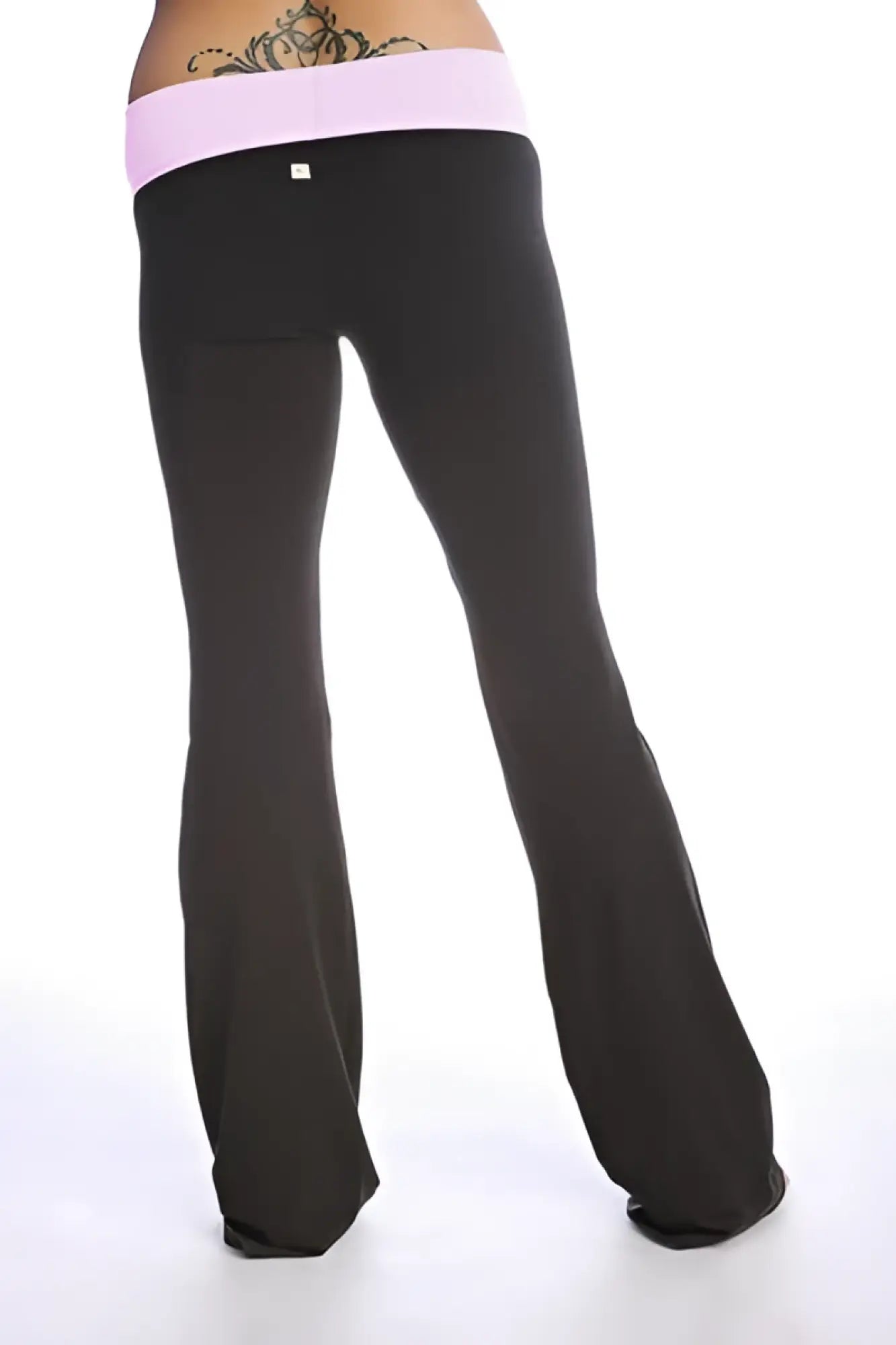 Black flared 4-rth women’s classic yoga pant with pink elastic waistband designed for comfortable activewear