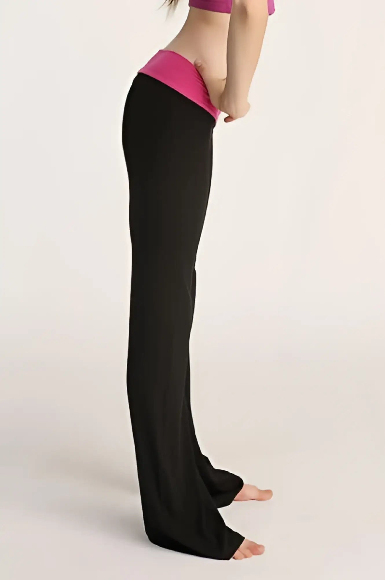 4-rth women’s classic yoga pant black wide-leg made from stretchy fabric with vibrant pink elastic waistband visible from back