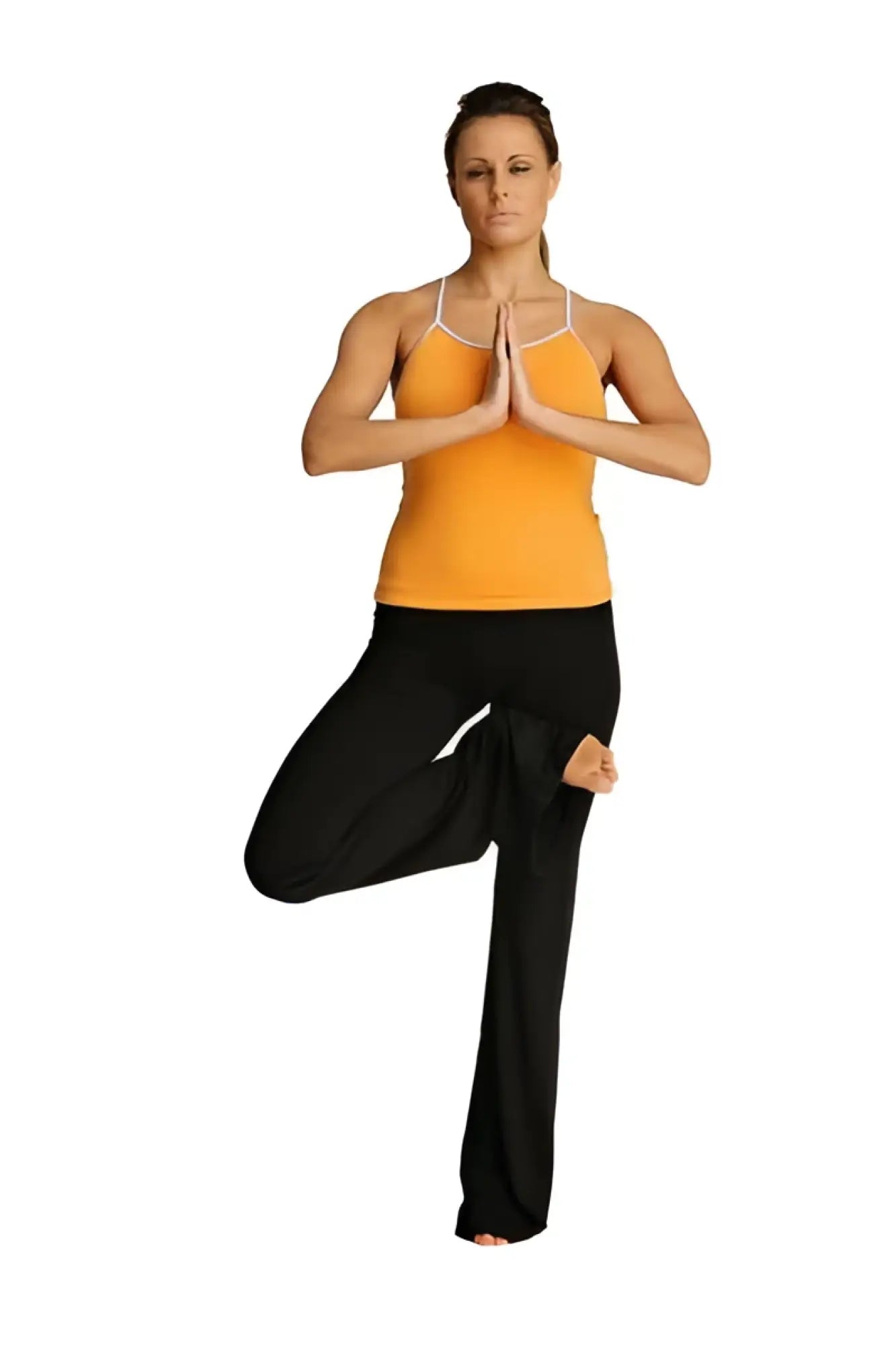 A woman wearing 4-rth women’s classic black yoga pants in tree pose with an orange tank top with white straps
