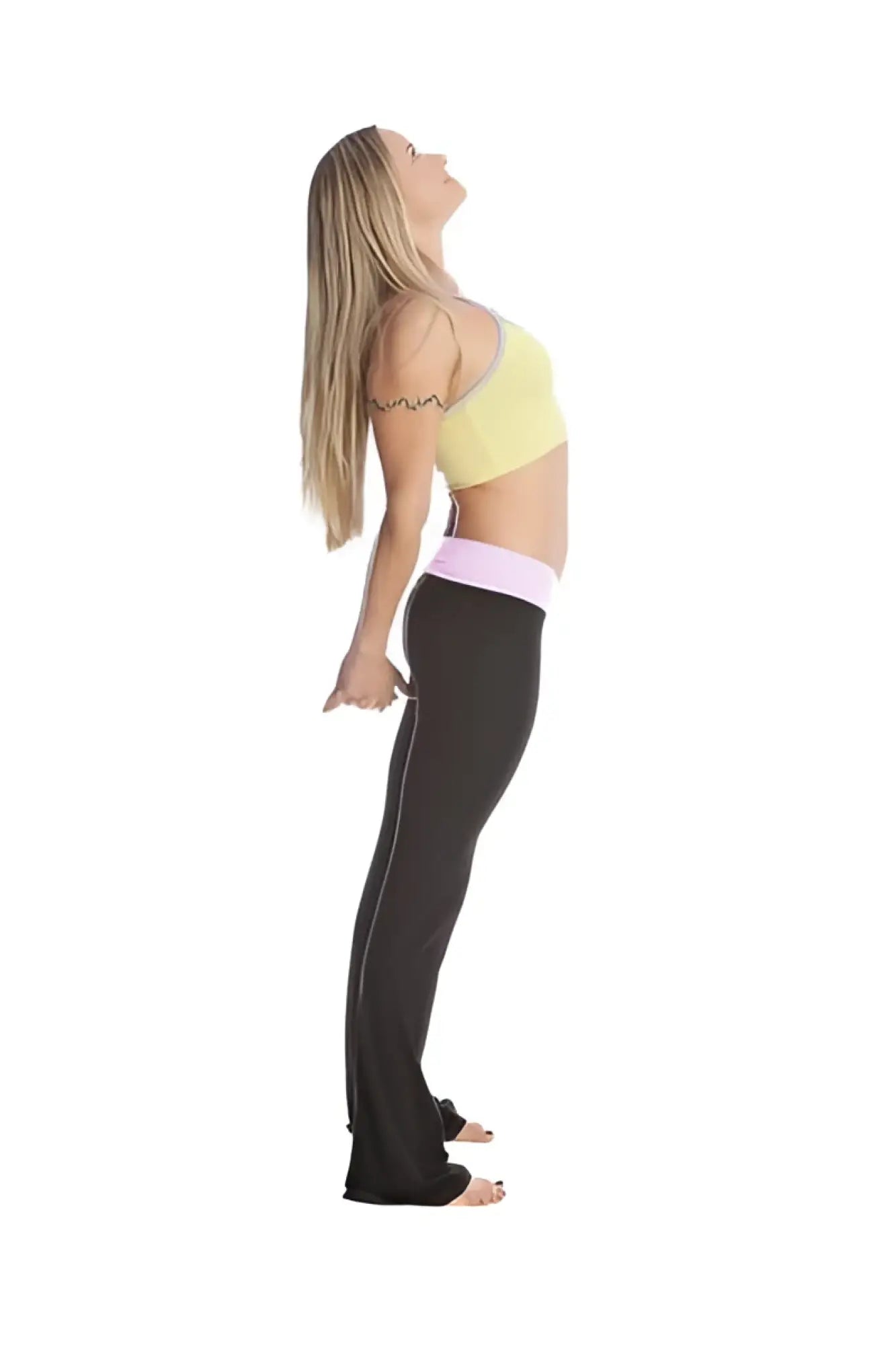 A woman wearing 4-rth women’s classic yoga pant black leggings with a light pink waistband and a yellow sports bra
