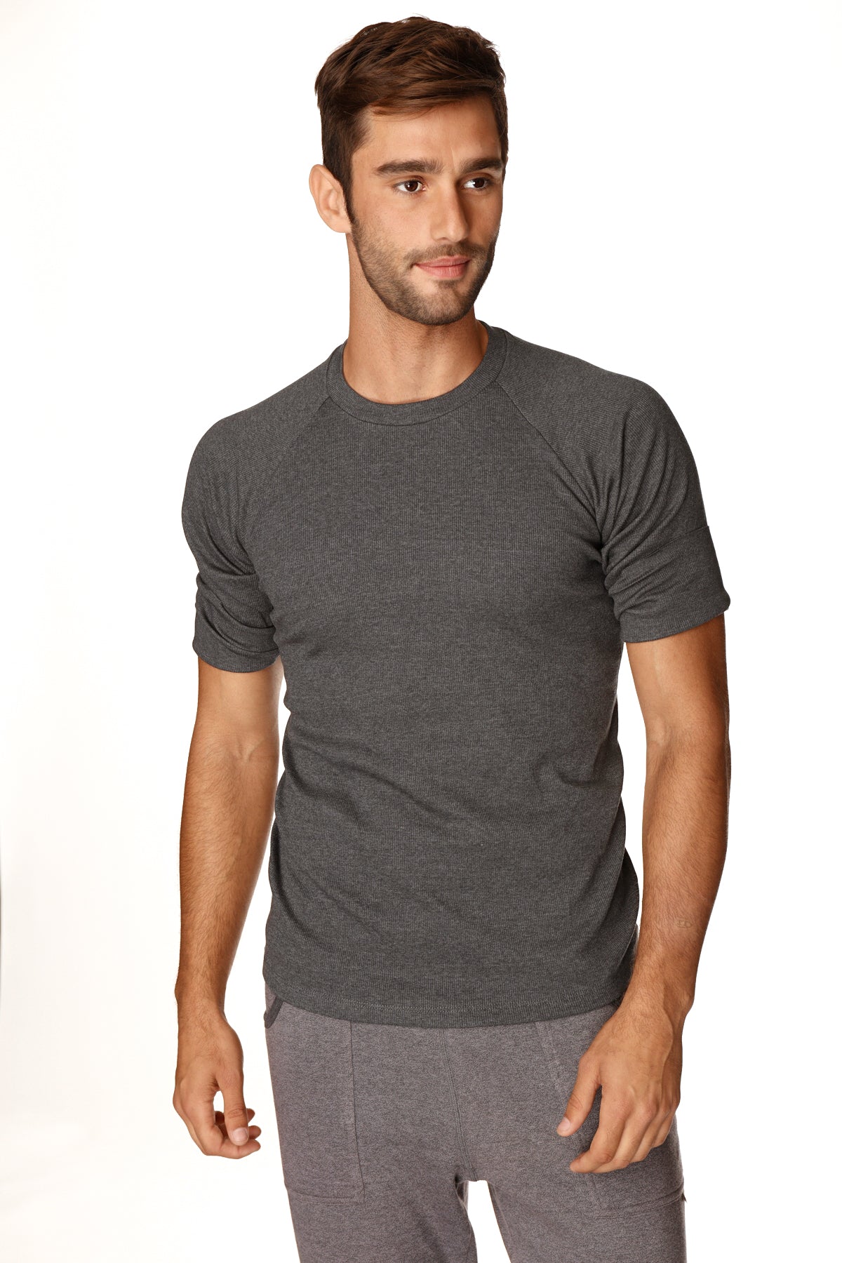 Hybrid crew neck raglan tee in dark heather gray with short sleeves and charcoal raglan detailing for casual wear