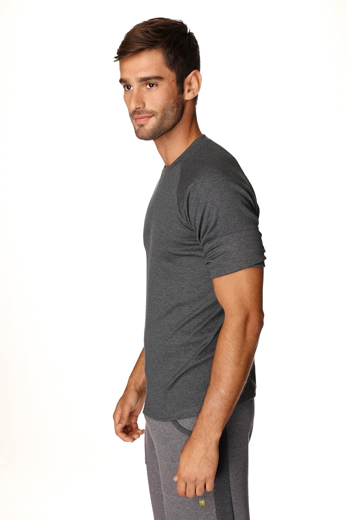 Dark gray heathered hybrid crew neck raglan tee with short sleeves made from soft breathable fabric
