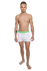 White boxer briefs with a bright green elastic waistband designed for performance and comfort in yoga activities