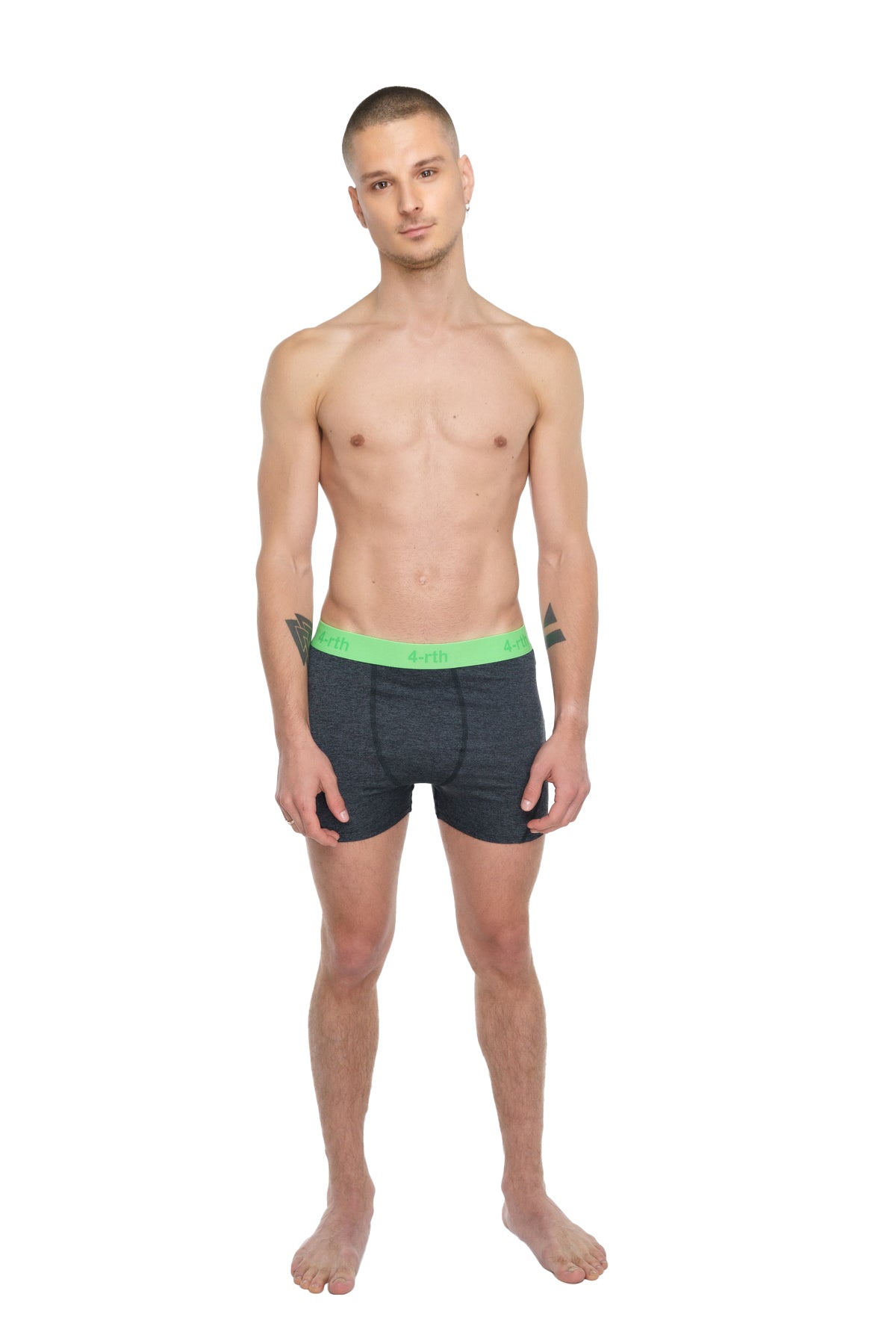 Dark gray boxer briefs with bright green elastic waistband designed for performance yoga and active use
