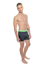 Black boxer briefs with bright green elastic waistband designed for performance yoga leggings in charcoal heather color