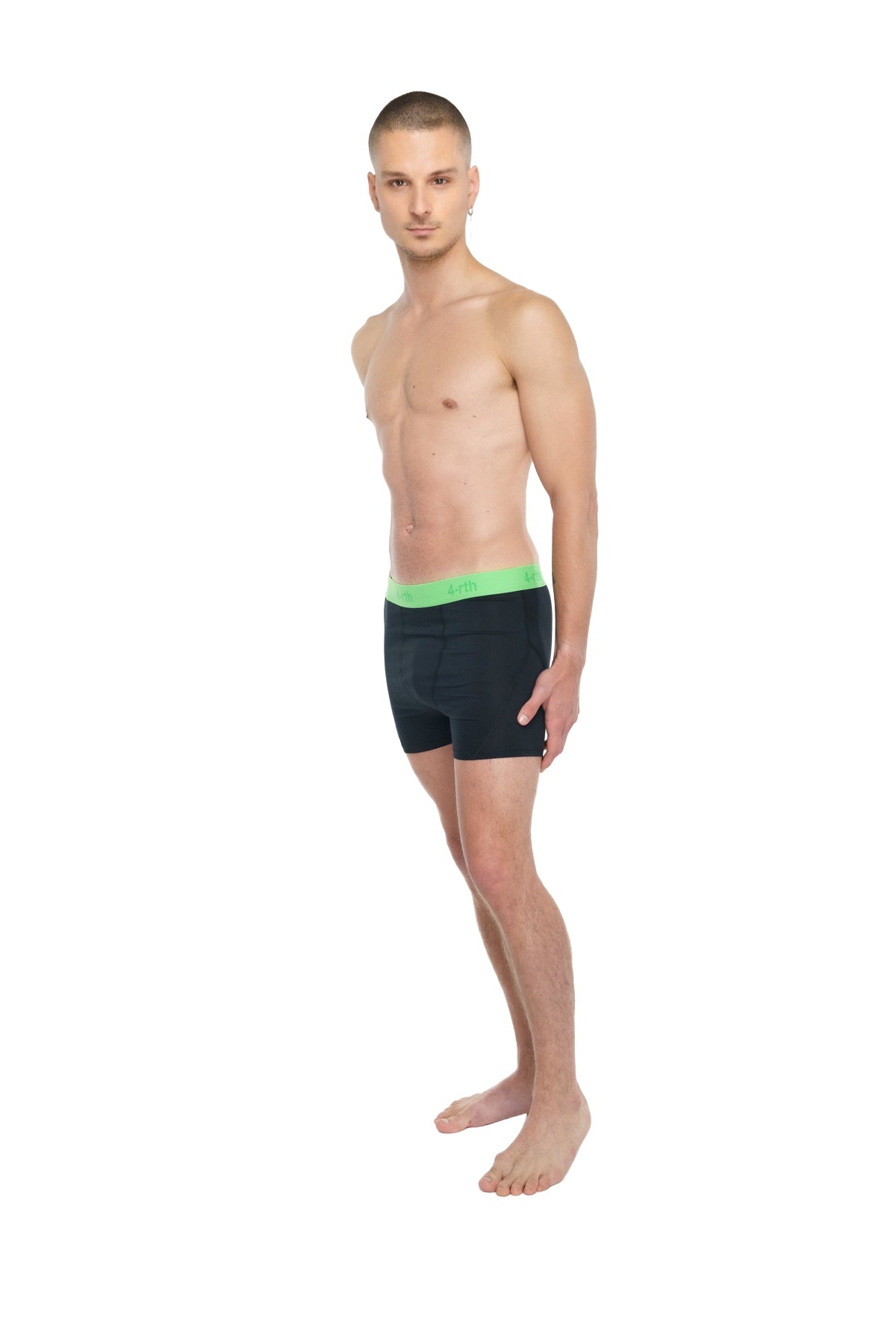 Black briefs with bright green waistband designed for performance yoga leggings short in carbon black color