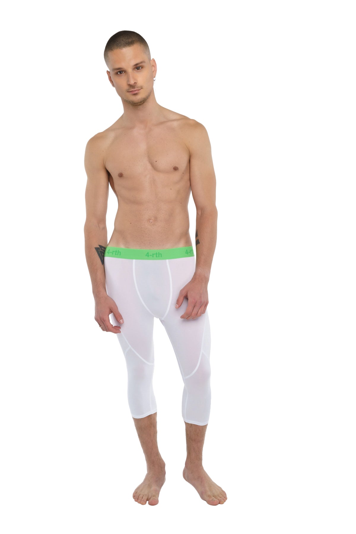 White capri-length performance yoga leggings with bright green elastic waistband designed for active wear