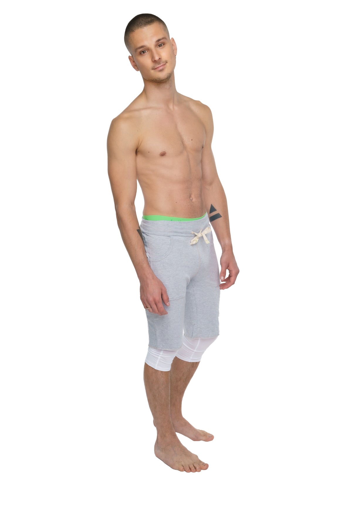 Performance yoga leggings 3/4 in arctic white featuring light gray semi-transparent shorts with neon green waistband and white drawstring