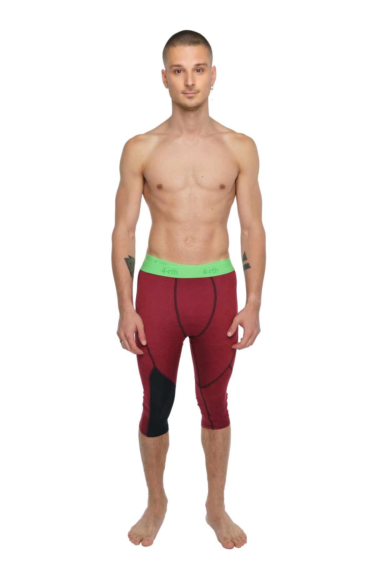 Performance yoga leggings 3/4 in brick red heather with maroon and black fabric and a bright green waistband