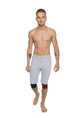 Performance yoga leggings 3/4 brick red heather with light gray shorts featuring neon green waistband and knee patches