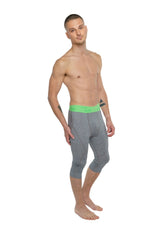 Performance yoga leggings 3/4 length in steel heather gray with a bright green waistband for active wear