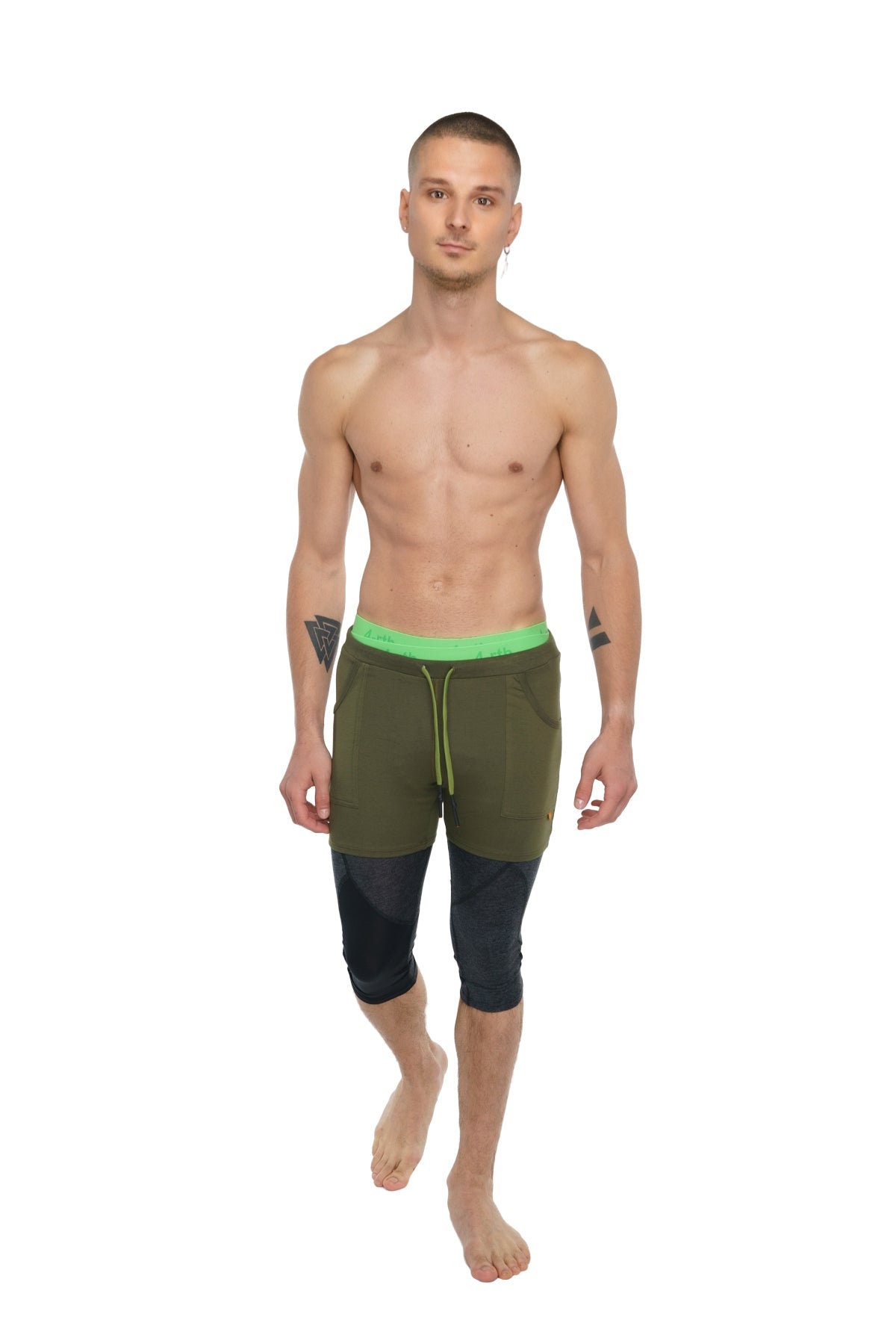 Olive green and black transition yoga shorts with neon green drawstring waistband designed for athletic use