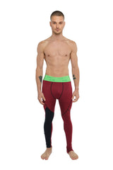 Performance yoga leggings long in maroon and black with a bright green waistband for athletic use