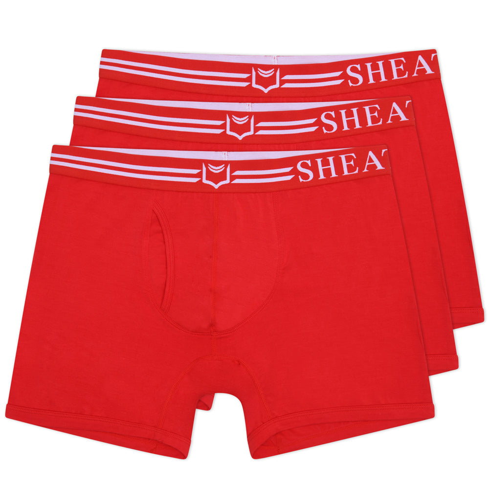Red men’s dual pouch boxer briefs with white elastic waistband featuring shea brand name from sheath 4.0 bundle