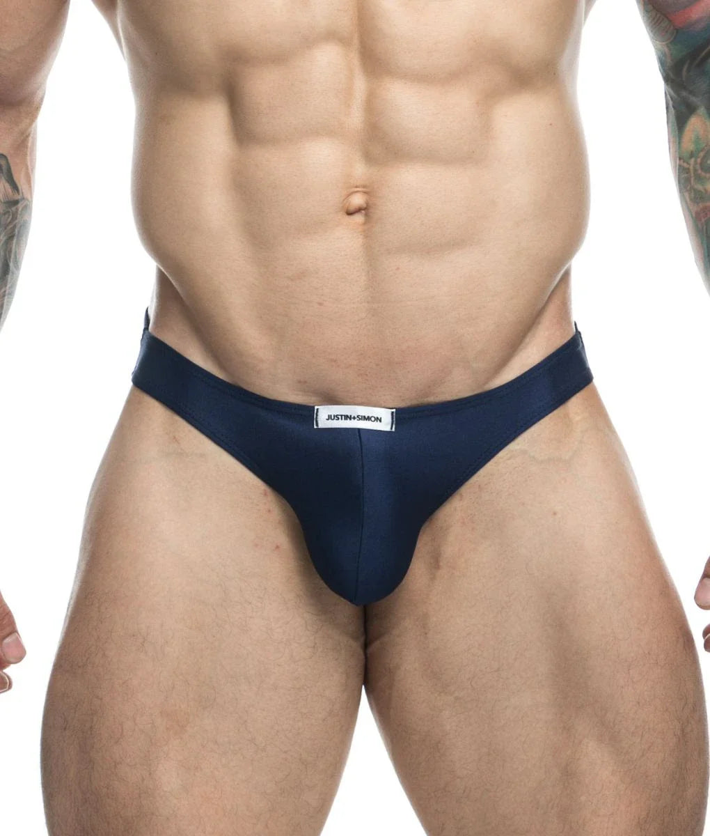 Navy blue justin and simon classic mens bikini briefs with white waistband label made from soft breathable fabric