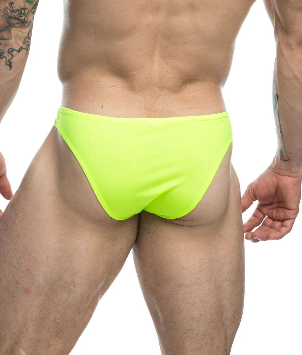 Justin + Simon classic mens bikini briefs in bright neon green featuring a comfortable stretch fabric design