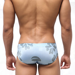Light blue metroMalewear classic swim brief with gray floral pattern ideal for beach and pool use
