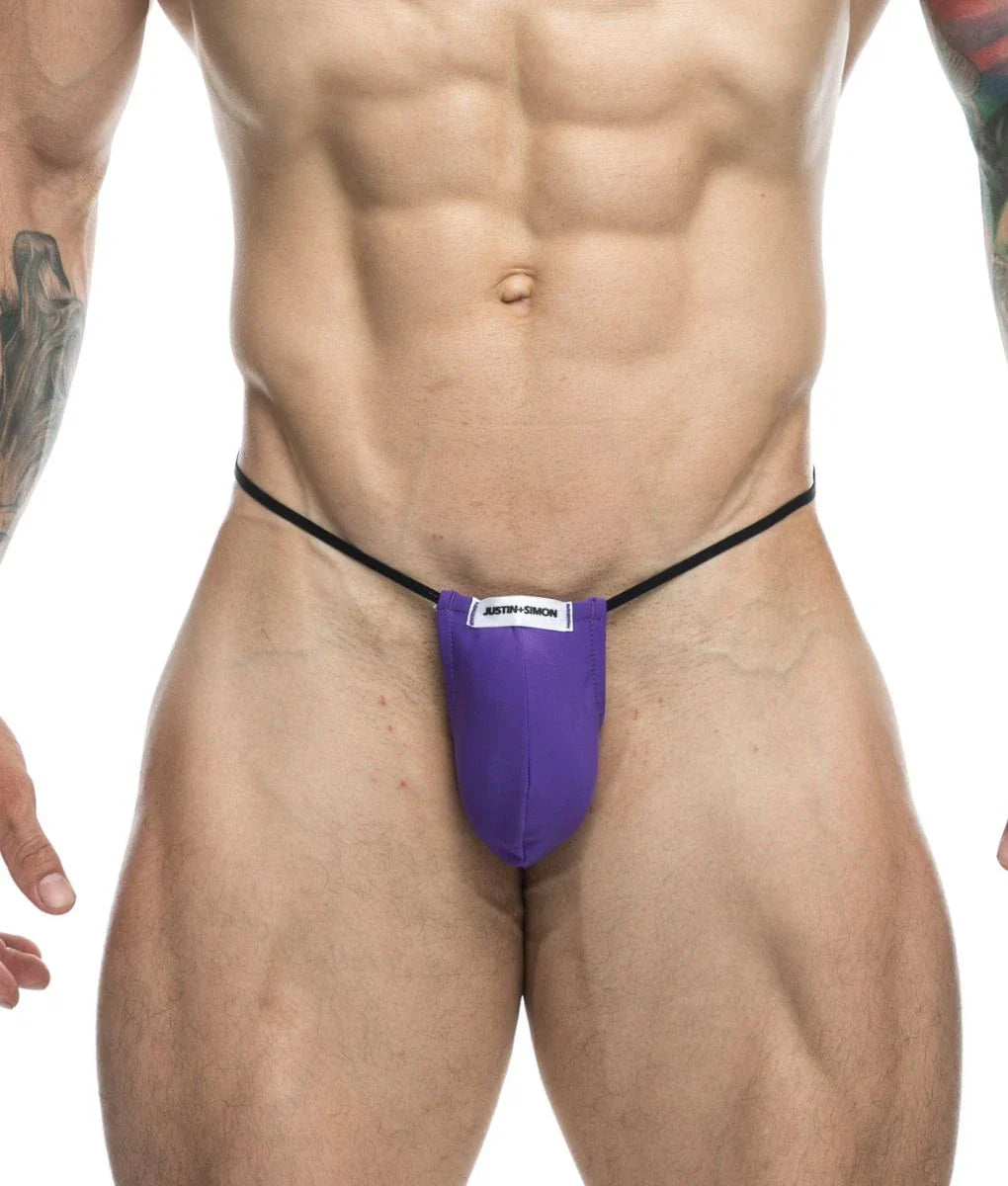 Purple classic g-string bulge briefs with black elastic waistband and white justin simon label for athletic use