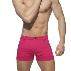 Bright pink 5 pockets summer shorts with a classic five-pocket design and black button closure in form-fitting style