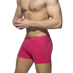Vibrant fuchsia 5 pockets summer shorts made of durable denim fabric with classic five-pocket design and button closure