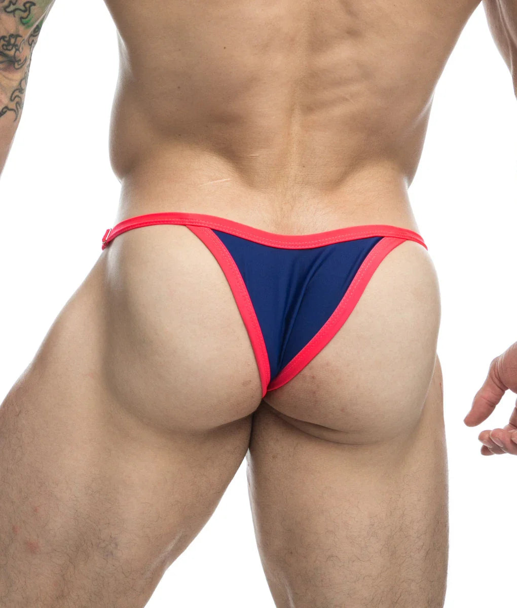 Justin + Simon bikini one final sale navy blue and neon pink thong with sleek form-fitting design shown from the back