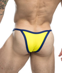 Bright yellow thong bikini with navy blue trim from Justin and Simon one final sale collection front view