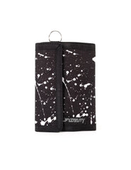 Black 80s velcro tri-fold wallet with white paint splatter pattern and silver metal ring at the top