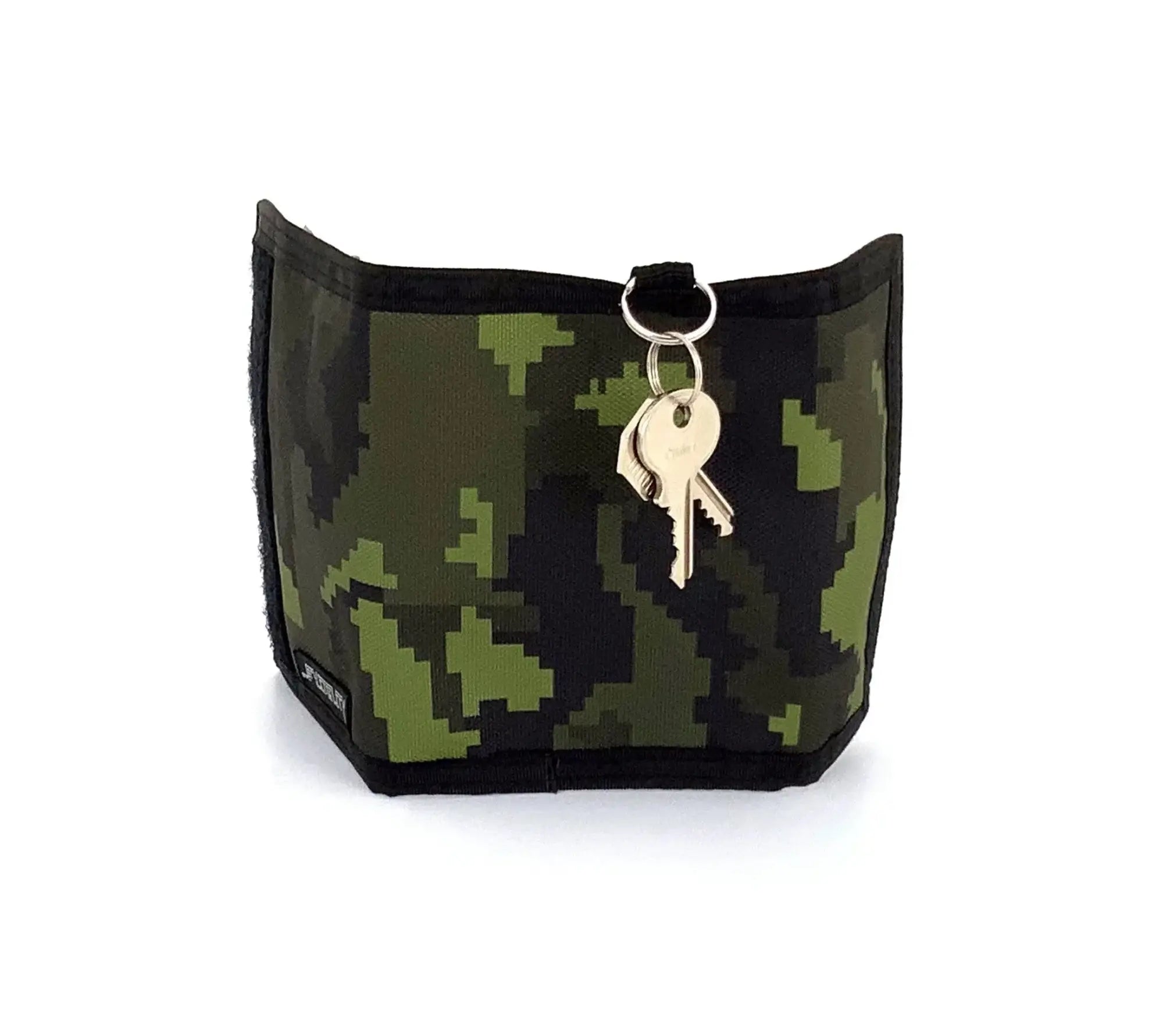 A compact 80s velcro wallet with green and black pixelated camouflage pattern and a key ring attached to the top