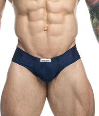 Navy blue justin simon cheek briefs with white waistband label designed for comfortable everyday wear