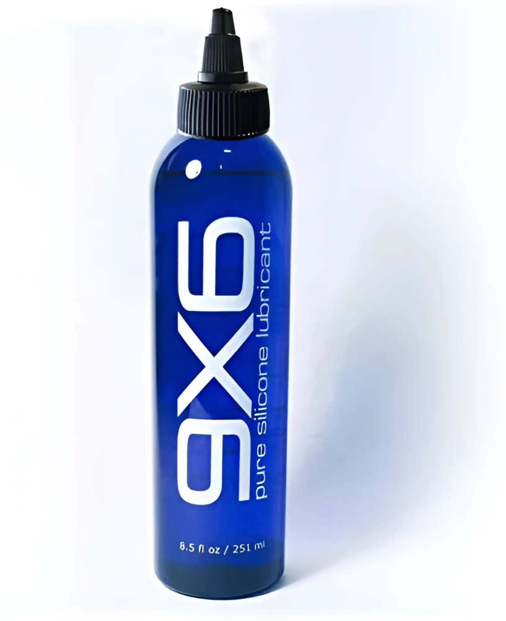 Blue glass bottle with black cap labeled 9x6 pure silicone lubricant 8.5 fl oz for smooth long-lasting lubrication