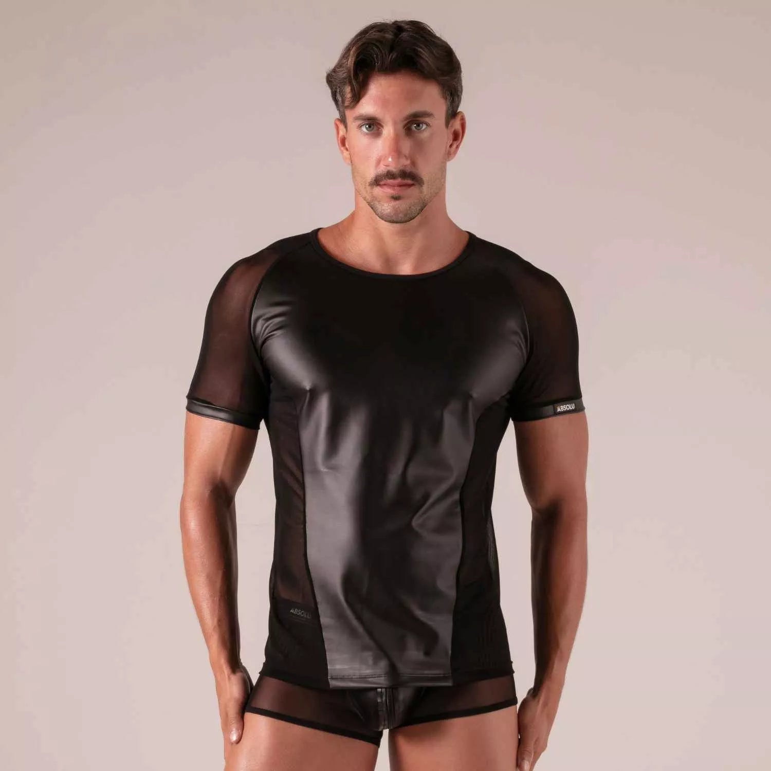 Black mesh and faux leather rebel t shirt with short sleeves and sleek modern design