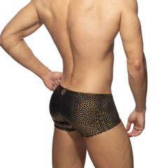 Black swim trunks with shimmering gold dot pattern for stylish beachwear in the gold stones trunk collection