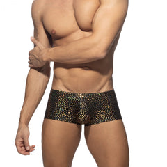 Black holographic patterned gold stones trunk swim trunks with shimmering iridescent finish for beachwear