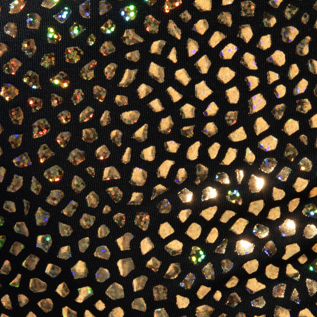 Black fabric gold stones trunk decorated with scattered gold and iridescent rhinestones in a mosaic pattern