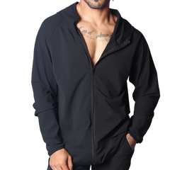 Gigo Ambitious black zip-up performance jacket with a hood, minimalist design, and lightweight technical fabric.
