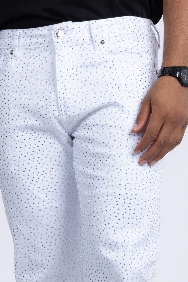 White denim dolorosa rhinestone jeans featuring a subtle pattern of small dark dots across the fabric
