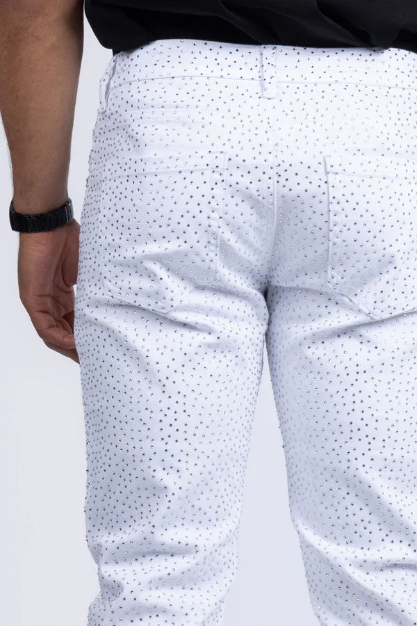 White dolorosa rhinestone jeans featuring a subtle black dot pattern on lightweight denim fabric