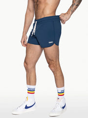 Navy blue bike track short with white drawstring and bike logo on the side designed for athletic use