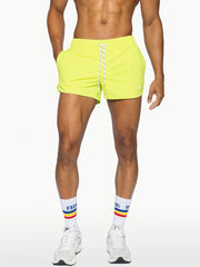 Bike track short bright neon yellow athletic shorts with white drawstring and elastic waistband for active wear