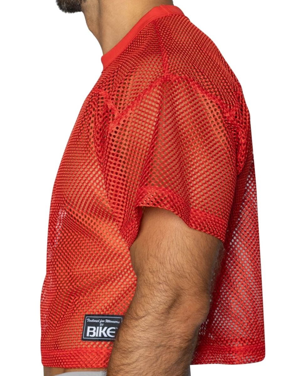 Bike athletic bam134 short sleeve practice jersey in bright red mesh with ribbed collar hem and black label on lower left side
