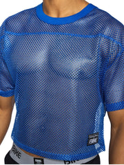 Blue mesh crop top with solid blue ribbed neckline and cuffs featuring black bike brand patch in royal color