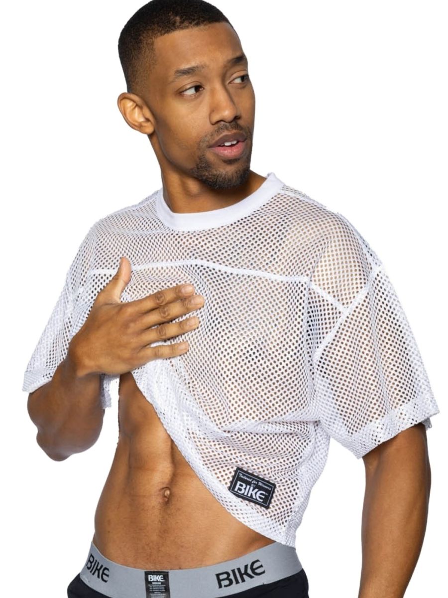 White mesh crop top with black bike logo patch on lower left side athletic short sleeve practice jersey