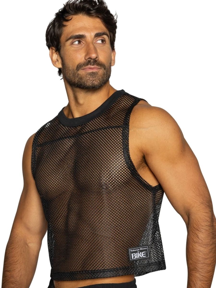 Black mesh crop top with solid black ribbed neckline and armholes featuring bike brand label on lower right side