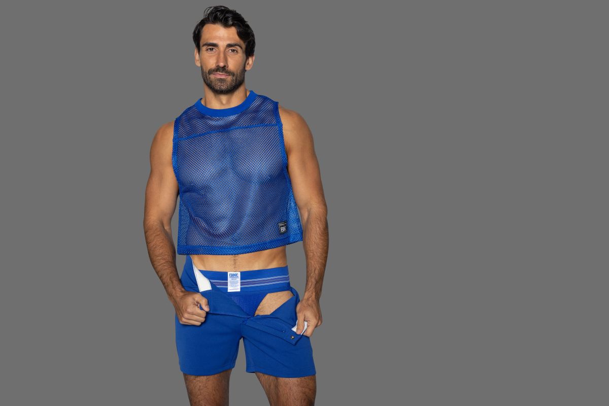 Blue mesh sleeveless practice jersey with cropped hem and subtle branding in vibrant royal blue by bike athletic