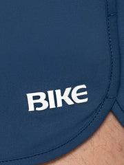 Navy blue bike athletic bam200 track shorts with white bike logo embroidered on the side for sports use
