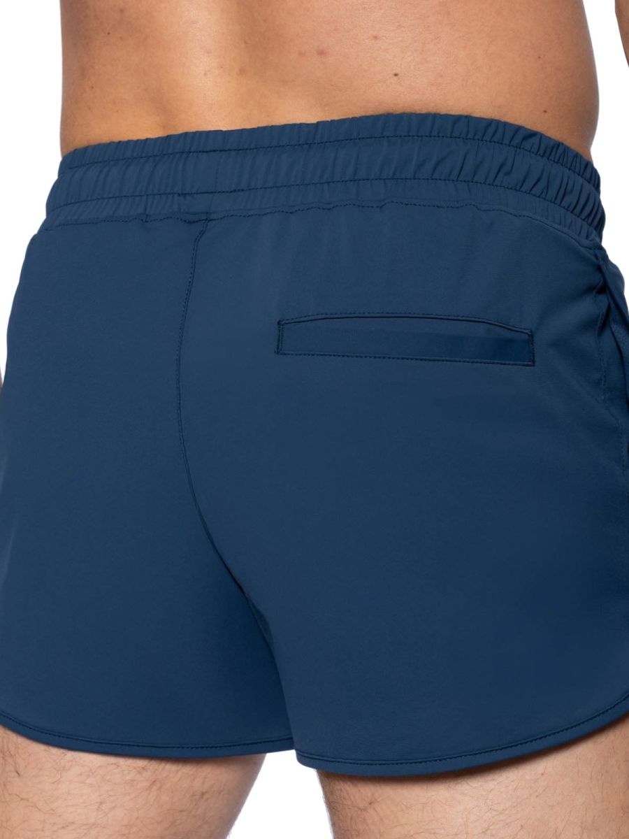 Navy blue BIKE Athletic BAM200 track shorts with elastic waistband and single back pocket shown from the back side