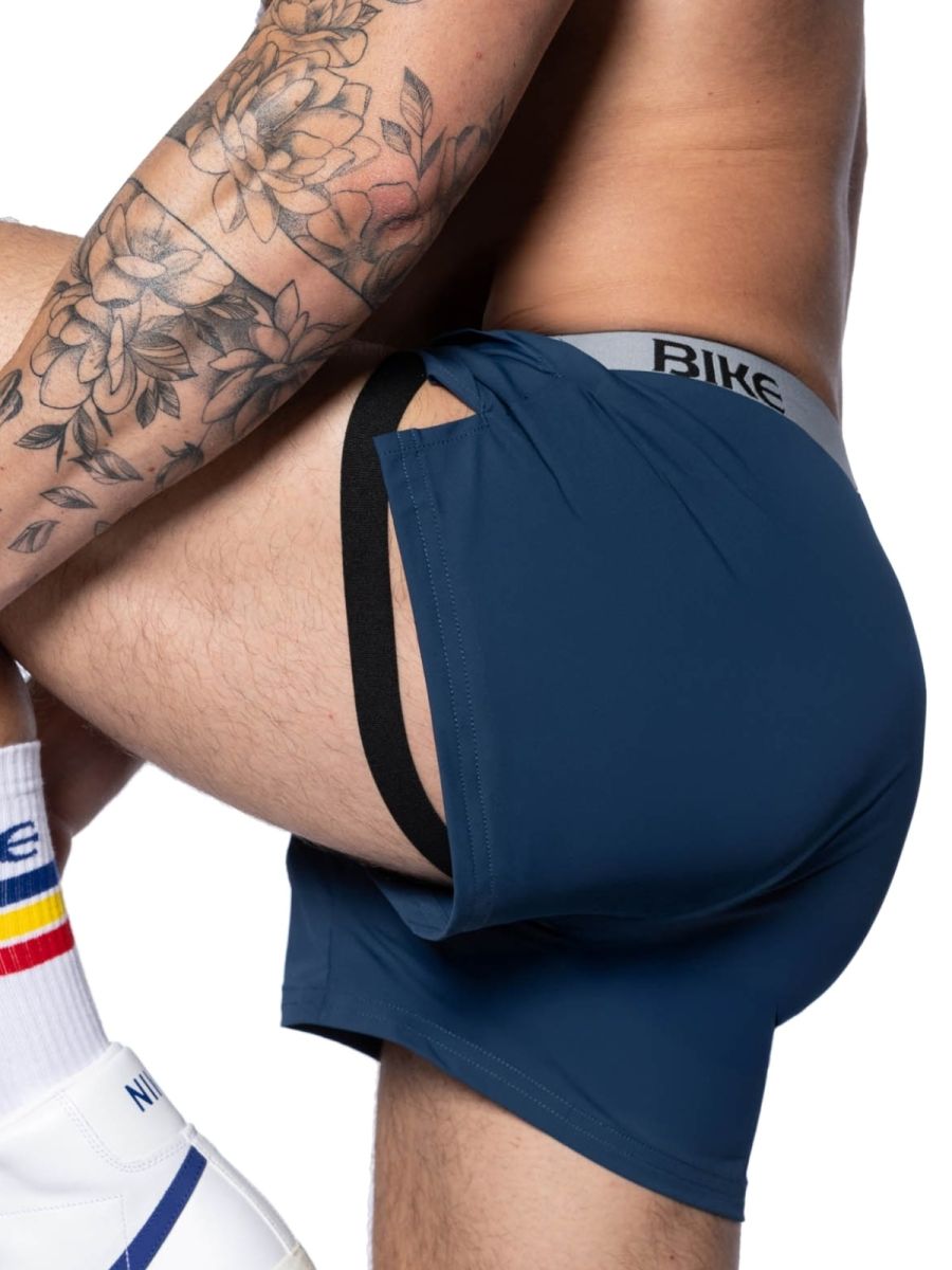 Navy blue bike athletic bam216 performance jock short with black side straps and gray waistband for active use