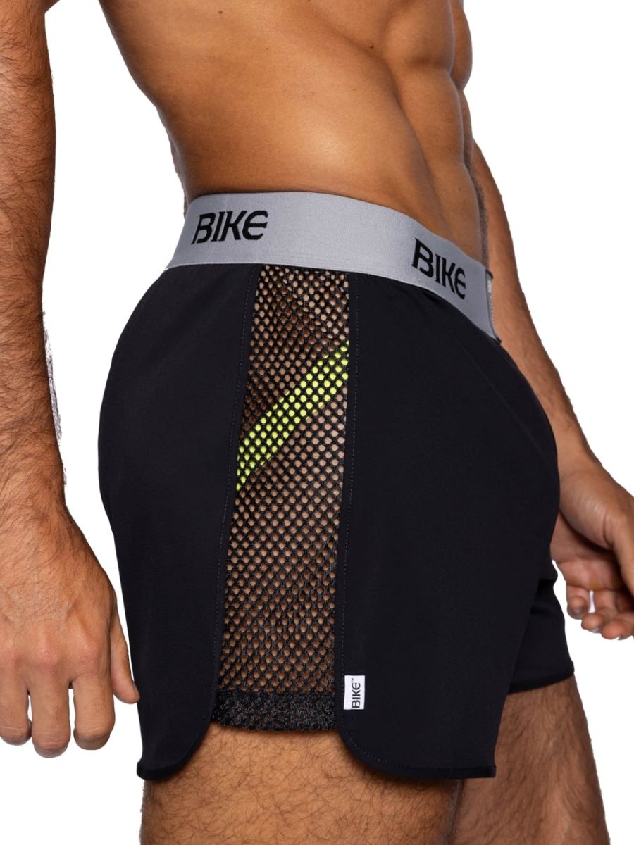 Black bike athletic BAM225 jock shorts with neon green mesh panel and gray branded waistband for active use