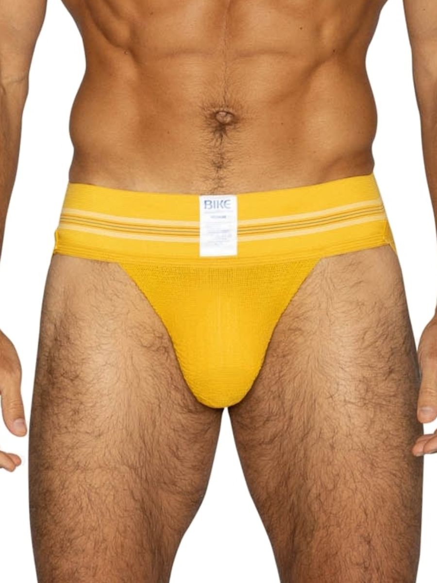 Bright yellow bike athletic briefs with white stripes and original number 10 label for sports use